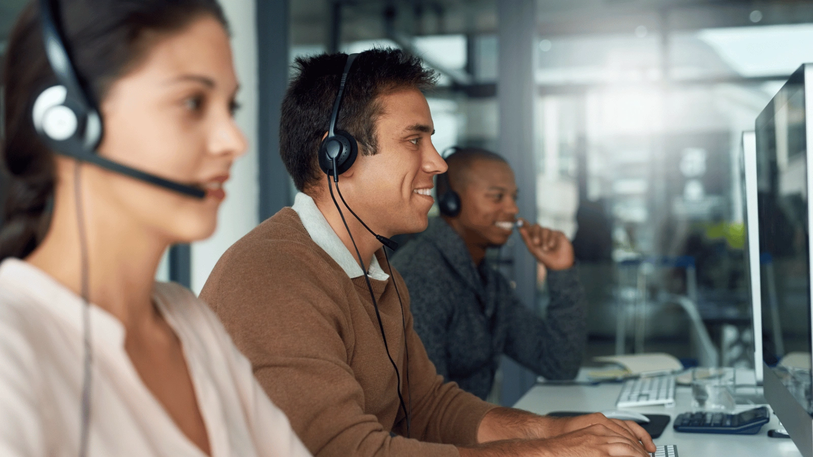 Expert team providing exceptional ecommerce customer support in a modern call center environment.