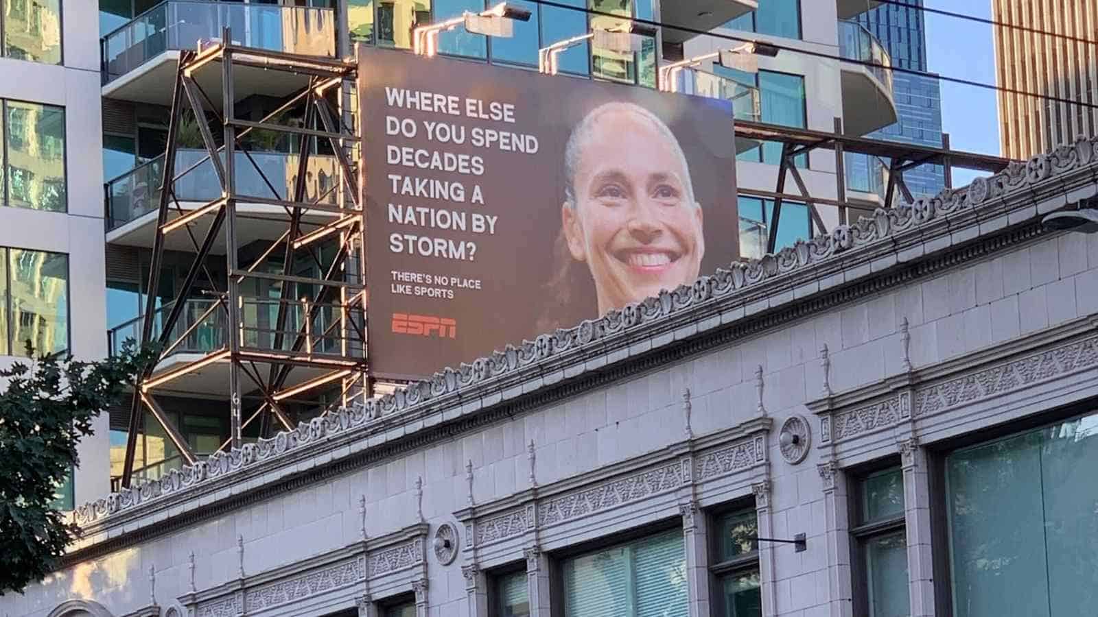 ESPN billboard with the slogan Where Else Do You Spend Decades Taking a Nation by Storm as a sports marketing examples display in the city.